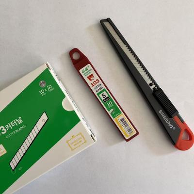 kupować Silver 9mm Cutter Blades Made of High Carbon Steel for Precision Cutting produkcja online